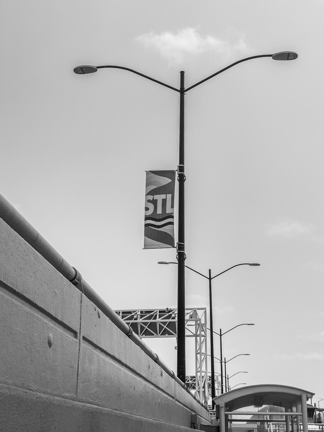 A street scene with an STL banner in the greater St. Louis area